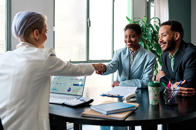 people shaking hands