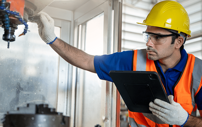 construction worker on a tablet
