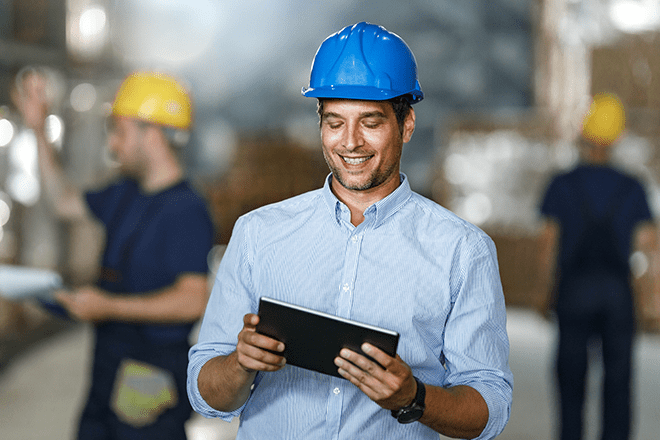 worker in ppe on a manufacturing floor