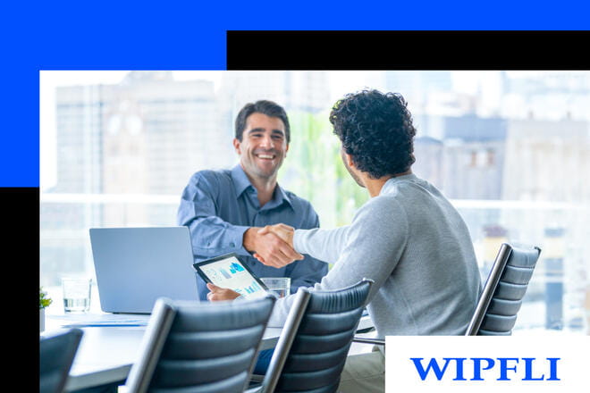 two men shaking hands