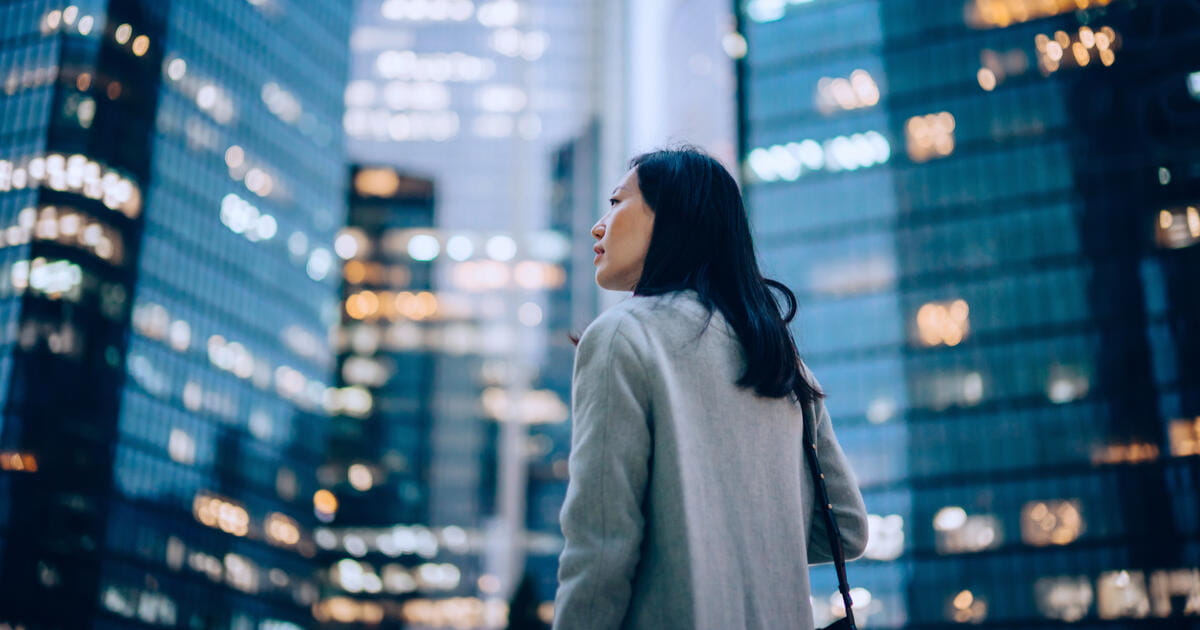 woman looking at buildings