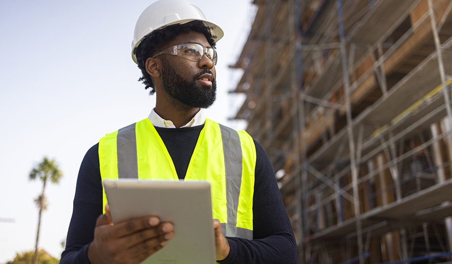 construction worker with a tablet