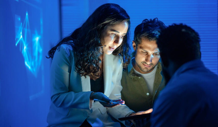 A teamwork, innovation, and late-night coding sessions with expert programmers brainstorming cutting-edge AI solutions. Perfect for modern tech and business visuals.