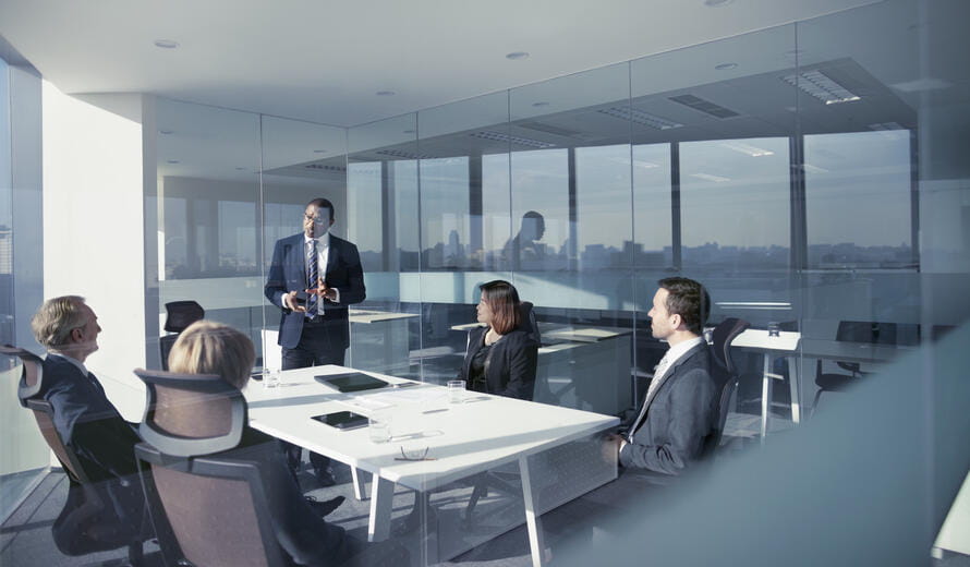 Group of business people team sitting together in conference meeting room