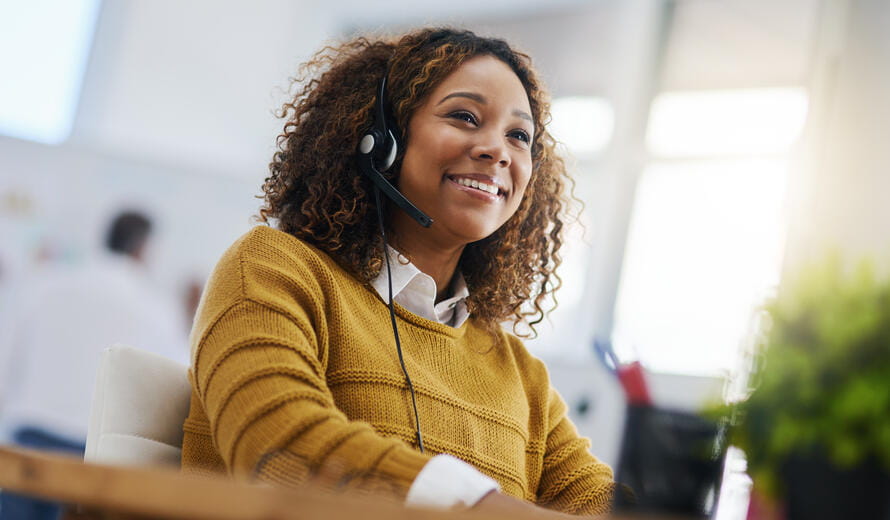 Shot of a female agent working in a call centre