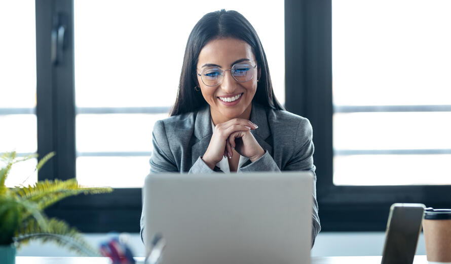 woman looking at a laptop