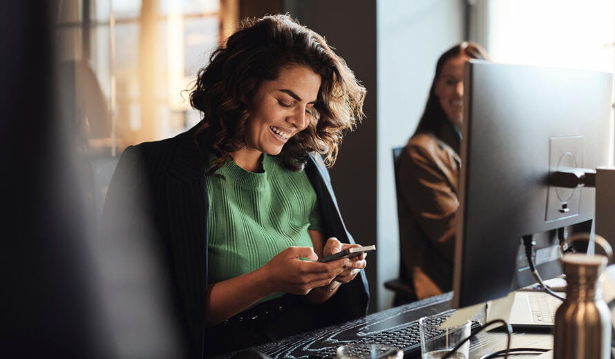 woman at office on her phone