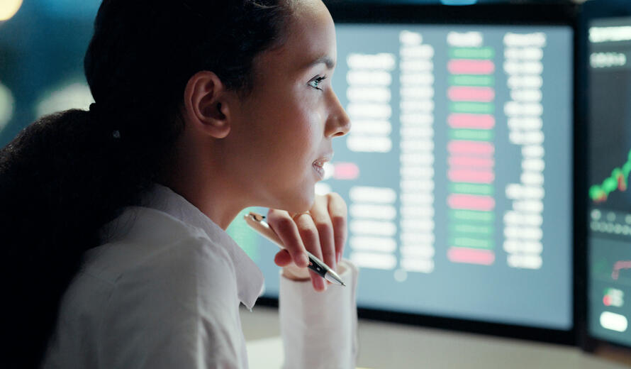 a woman looking at a screen