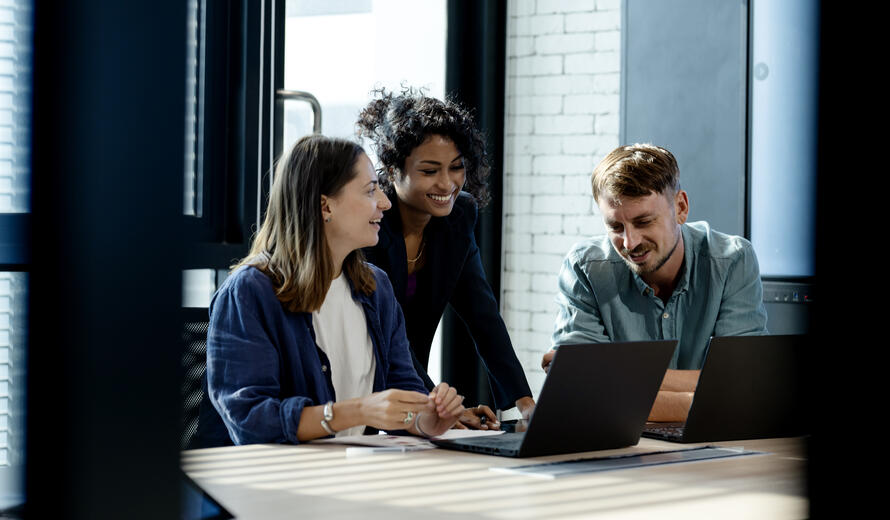 Use Performance Insights To Drive Business Growth. Team of business development is on a data discussion to improve solutions, products, or services during a meeting in a business office.