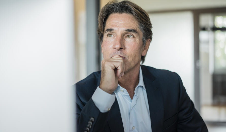 man looking at a screen