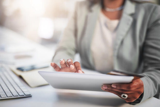 close up of a woman on a tablet